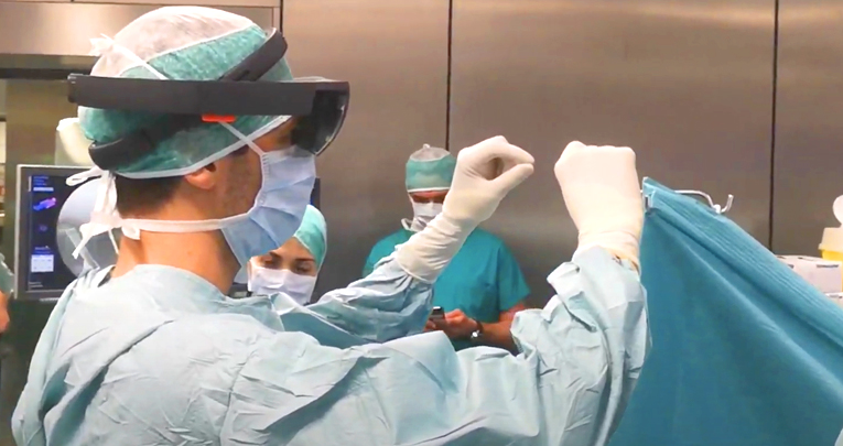 Augmented Reality in Medical Practice: From Spine Surgery to Remote Assistance