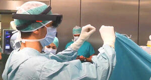Augmented Reality in Medical Practice: From Spine Surgery to Remote Assistance